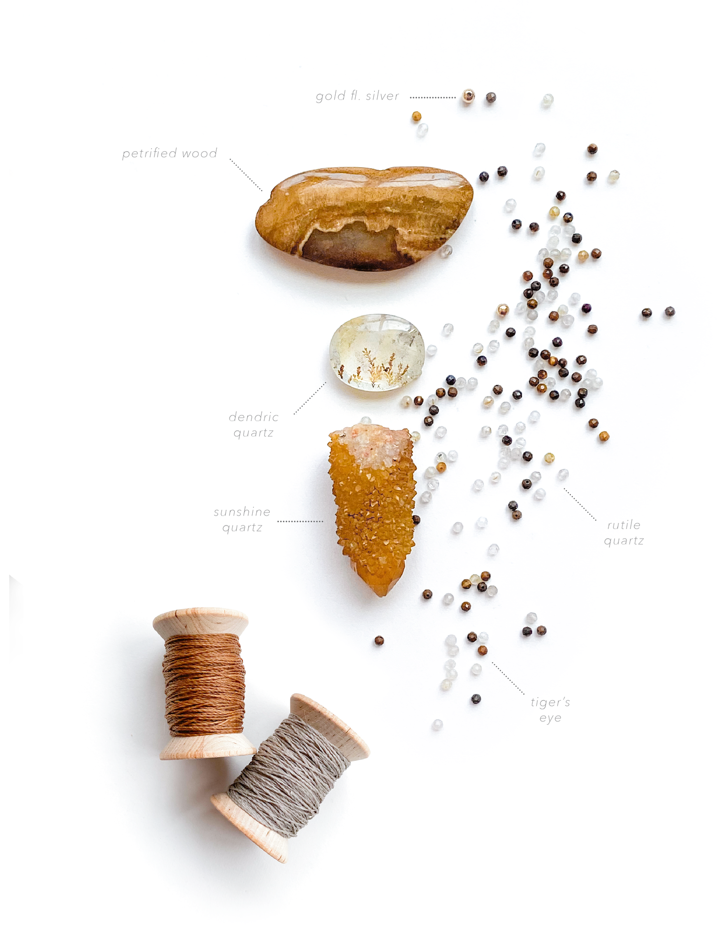 One of a kind made to order necklace. Golden Healer Spirit Quartz, Dendric Quartz, Petrified Wood, Tiger's Eye Silver & Gold are held together with hundreds of knots, made with love with intention to open your heart and shine the light on the beautiful being you are. Deconstructed piece on white background.