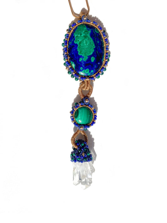 Close-up view of the one-of-a-kind necklace on a white background – Malachite, Azurite, Clear Quartz, Lapis, Silver & Gold, intricately knotted to celebrate your individuality.